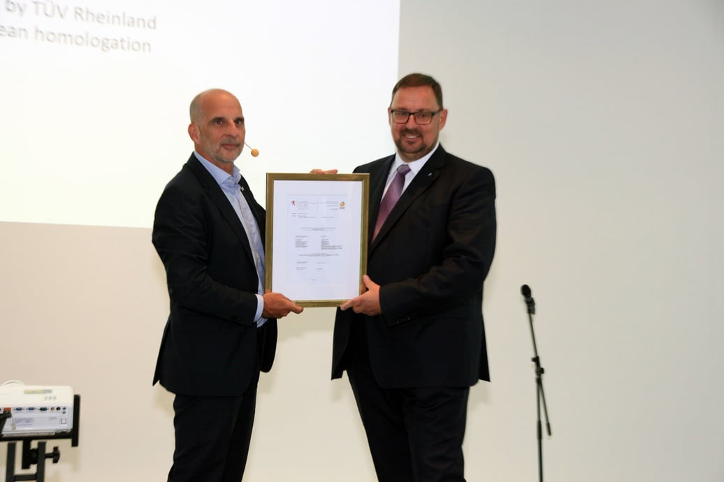 Alex Klose, AIWAYS Executive Vice President for Overseas Operations, received the AIWAYS U5 EU WVTA certificate from Gunnar Pflug, Western  (Large)